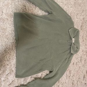 light green knit quarter zip sweater